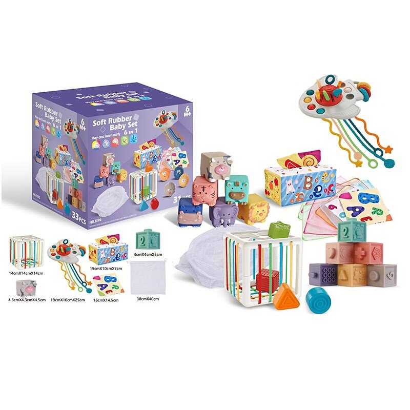 Набір для розвитку 1293 (18) 33 елементи, кубики, брязкальця, прорізувачі, серветки, мішечок, куб із формами, в коробці