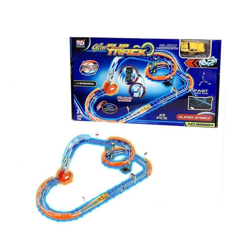 Трек 89984 (24/2) 42 елементи, машинка із вбудованим акумулятором, підсвічування, світиться у темряві, трюки, муляжі оточення, в коробці