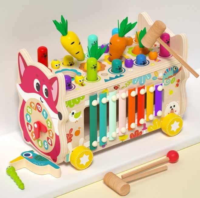 Каталка C 75299 (24) дерев'яна, ксилофон, грядка з морквинами, рухомі шестерінки, гра з “вибиванням” фігурок, годинник з рухомими стрілками, магнітні черв’ячки і пташка, дзеркало, в коробці